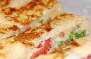 Курица под помидорами и сыром